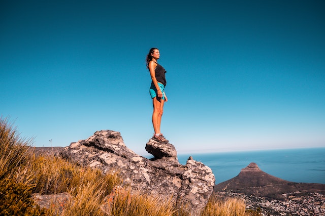 Women on top of a mountain